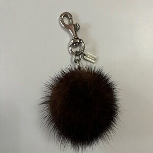 Coach fur ball keychain with silver hardware